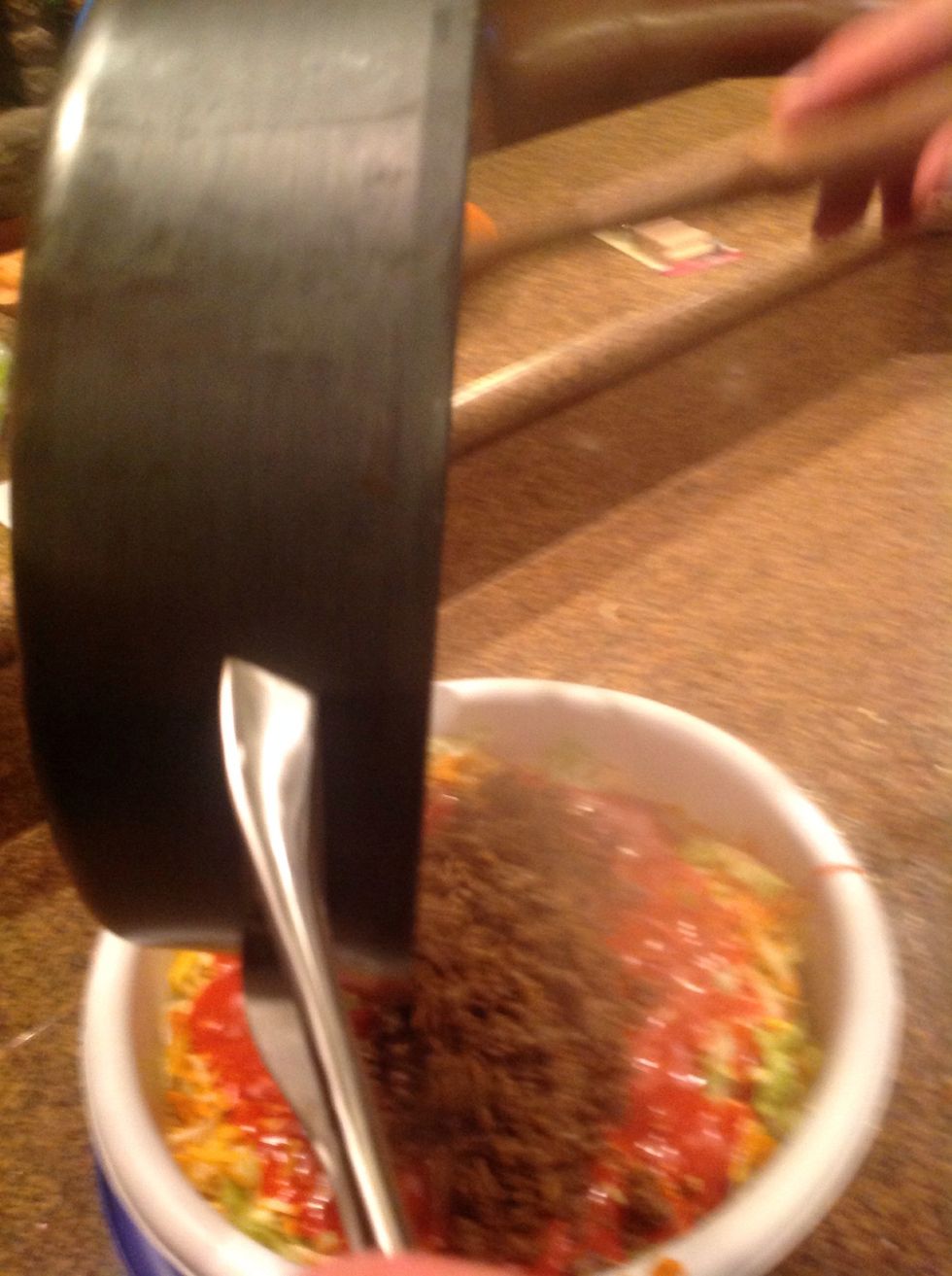 Add the meat into the bowl then mix well. Finally, enjoy!