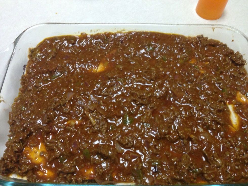 Add the meat mixture.