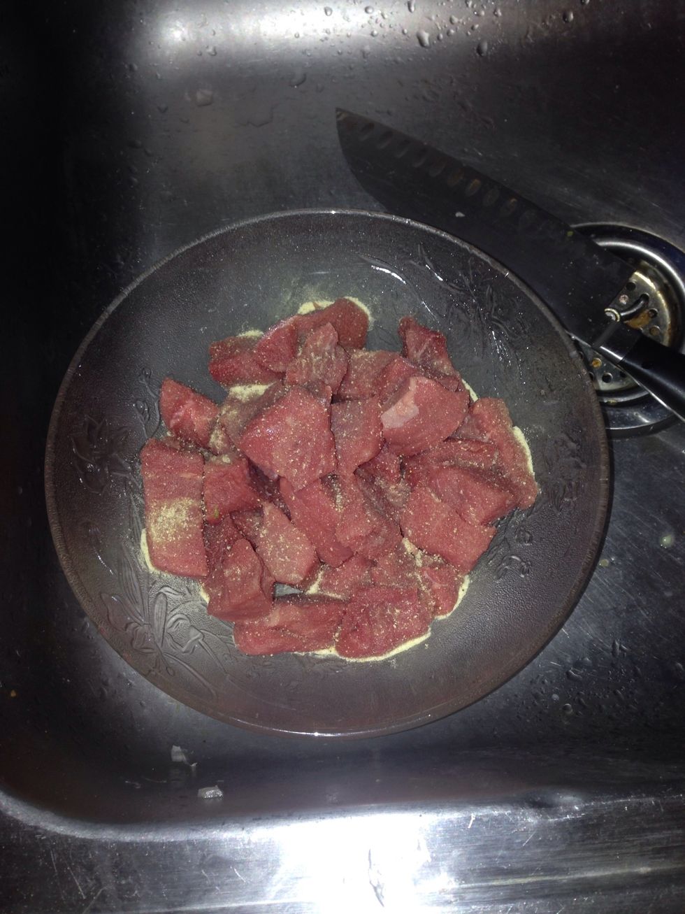 Add the meat to the bowl , And add your seasoning I like to use Goya adobo, salt, black pepper, paprika to give color And add flavor, some bijol to give it color , a pinch Of oregano