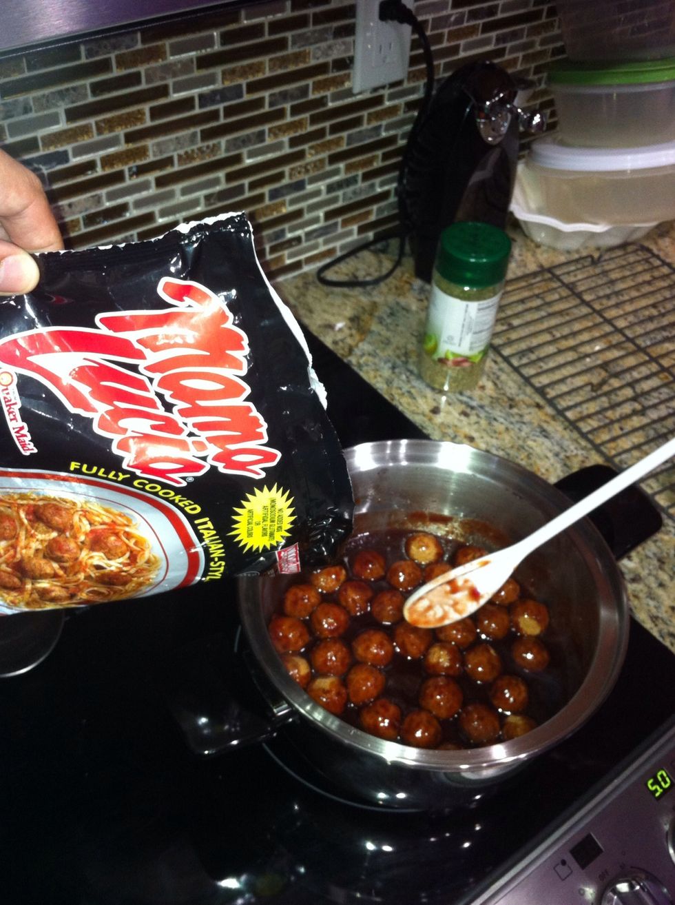 Add the meatballs from the bag.  -Again, the amount is up to you. Just remember to use equal parts of jelly and sauce.  -Stir occasionally.
