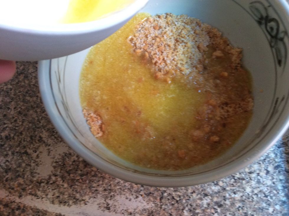 Add the melted butter and mix