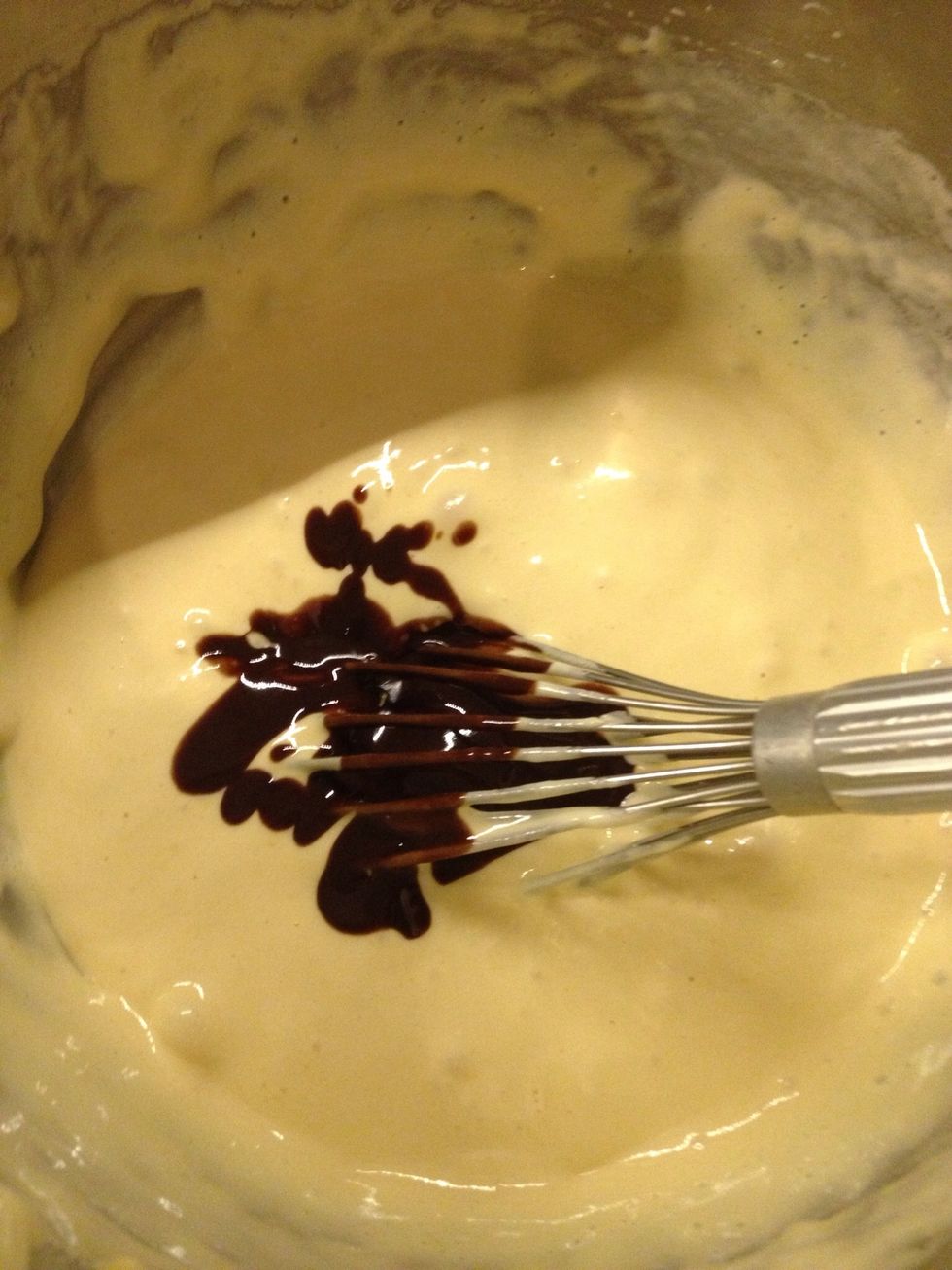 Add the melted chocolate a bit at a time to your egg and sugar mix