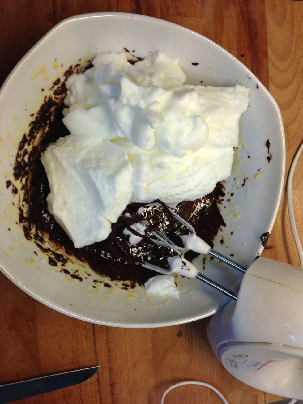 Add the melted chocolate and egg whites to tour misture and mix it well.