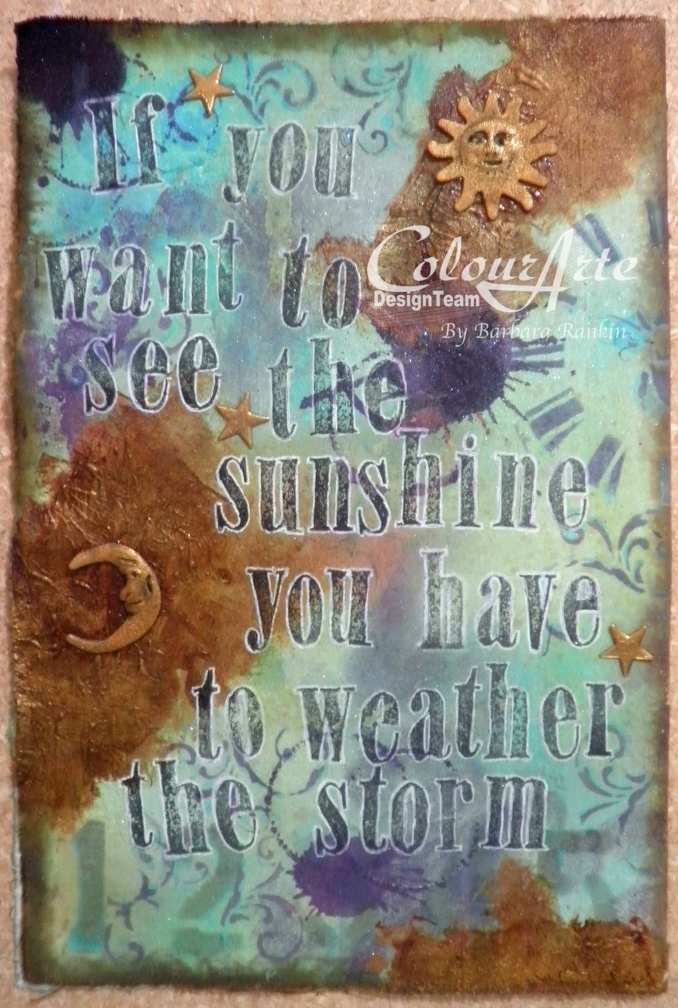 Add the metal charms to the page, as shown, and you are finished!