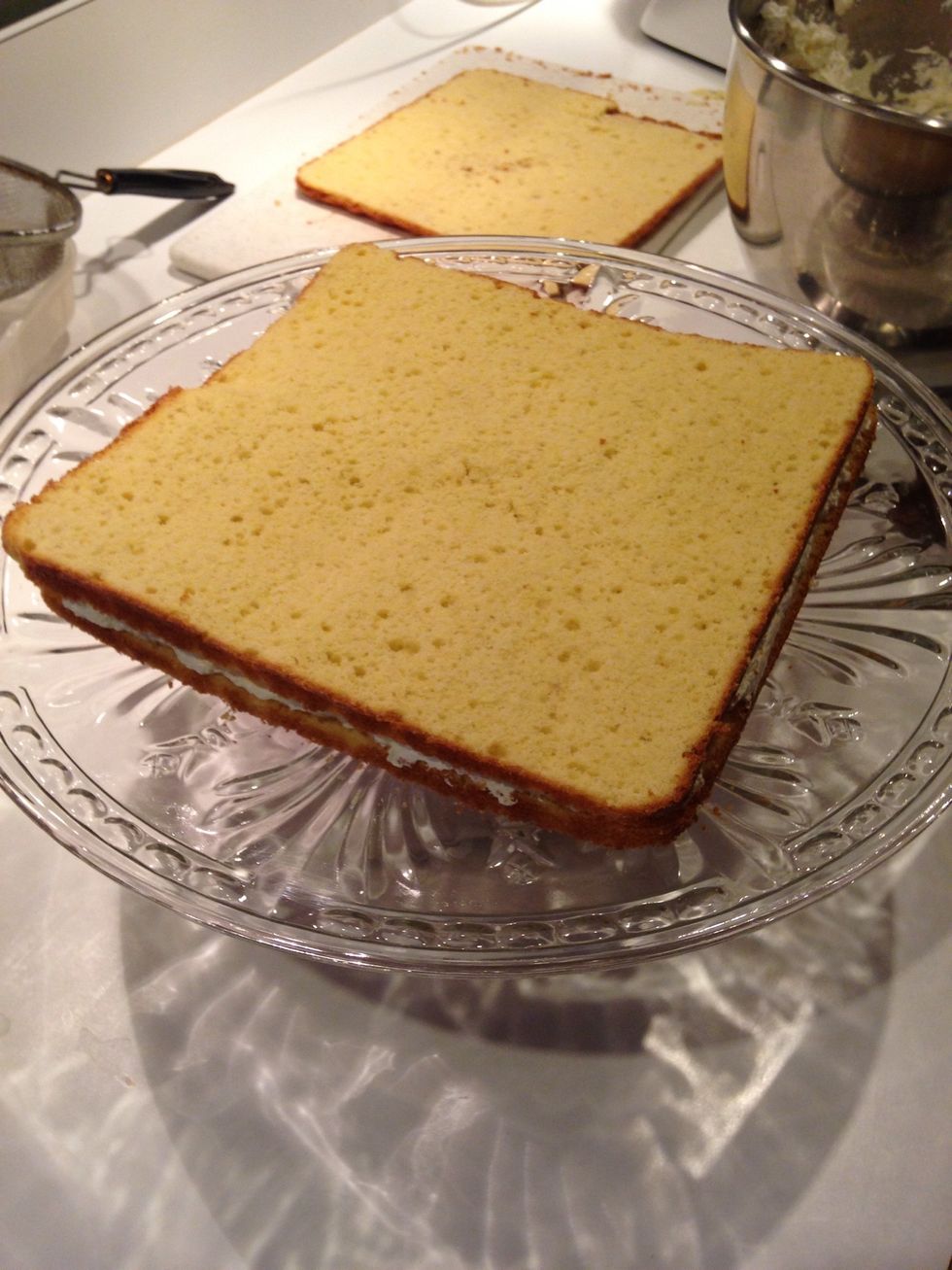 Add the middle layer of cake.