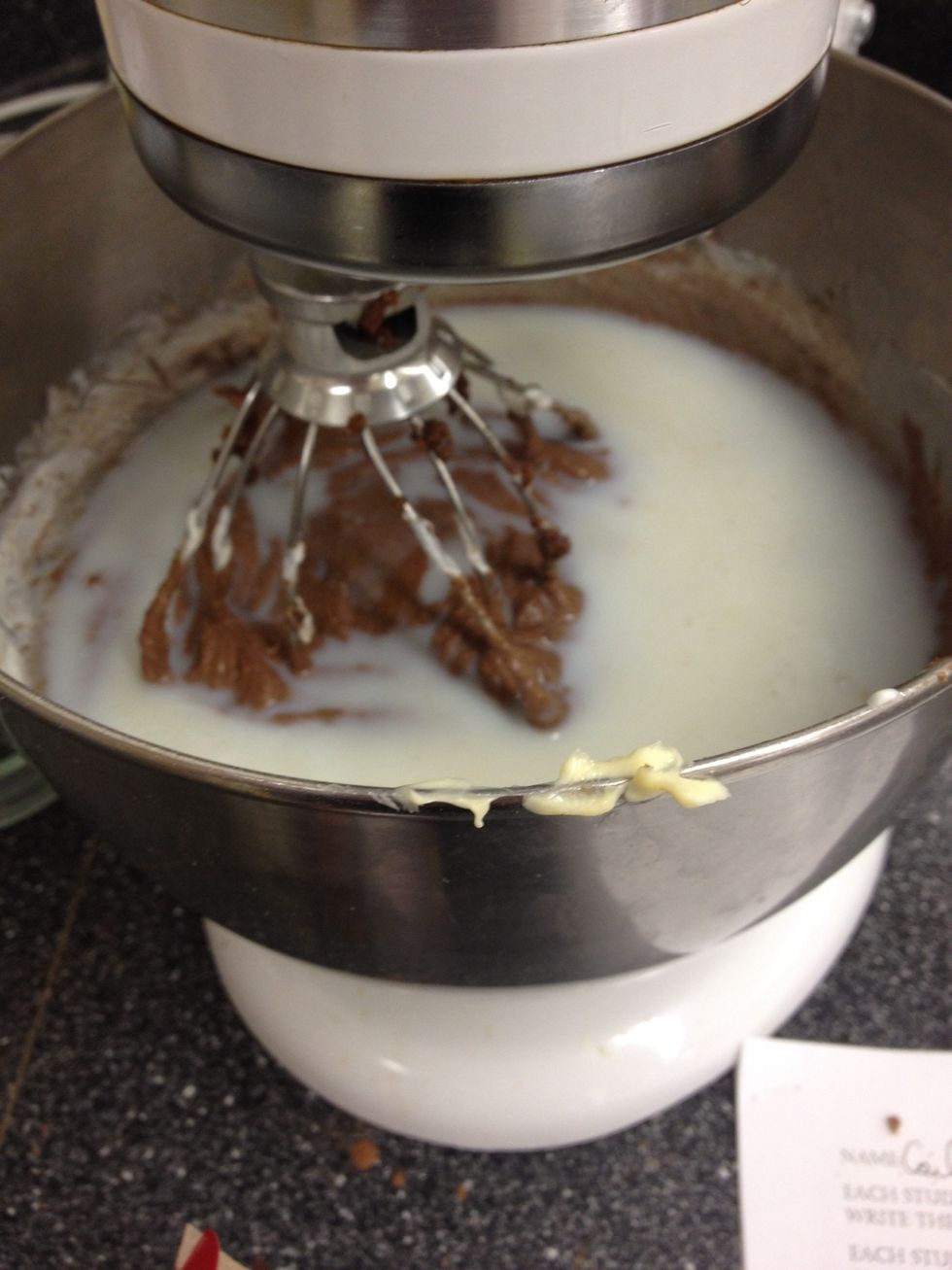 Add the milk and mix