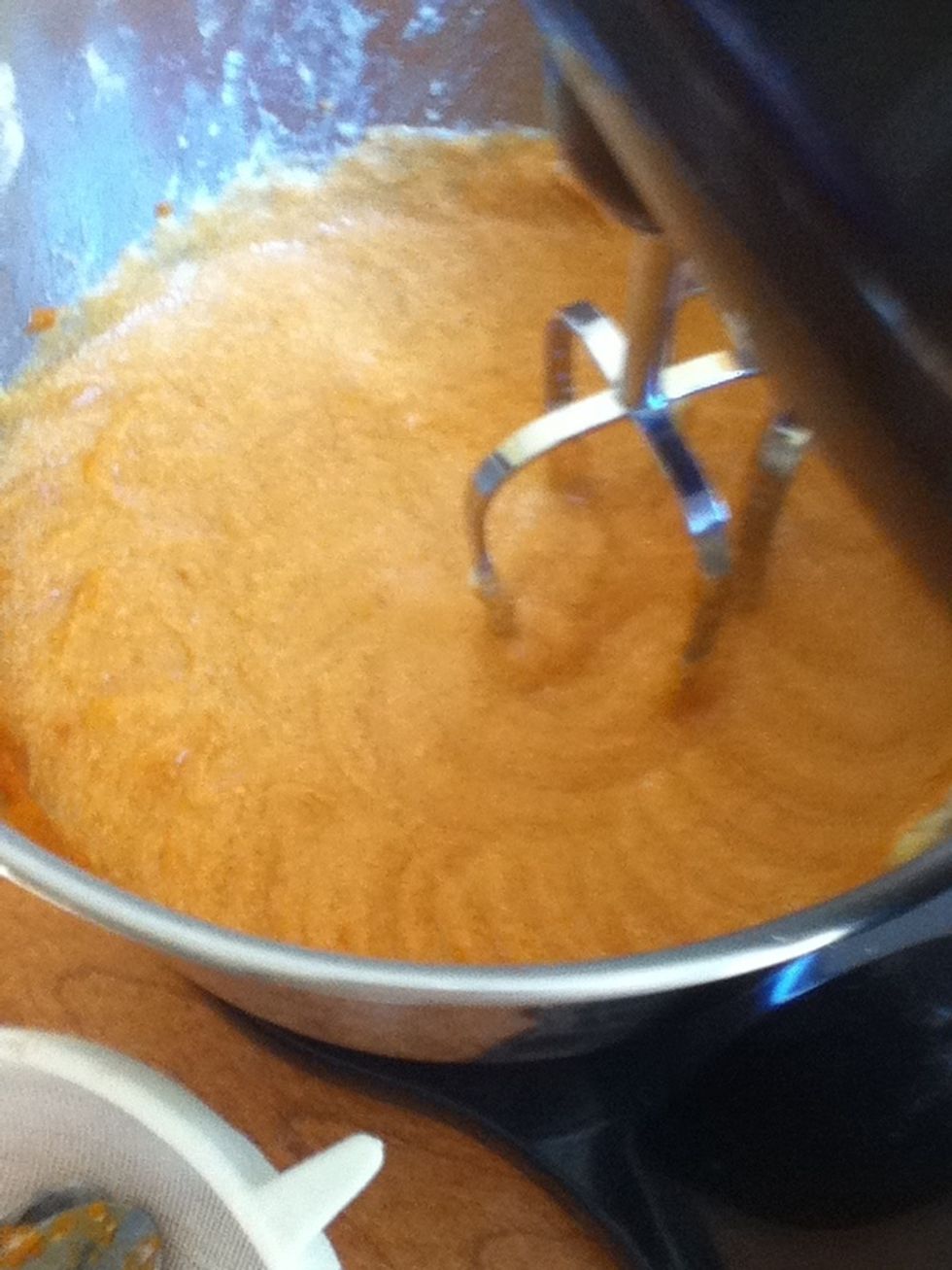 Add the milk and pumpkin.