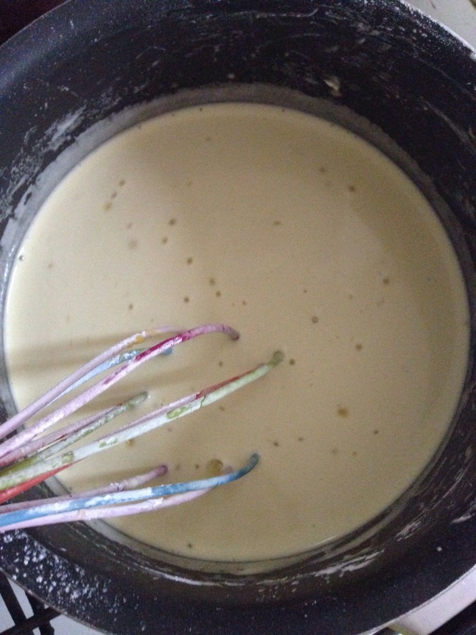 Add the milk ant starch, put into the medium heat and bring to the boiling. Do not stop whisking