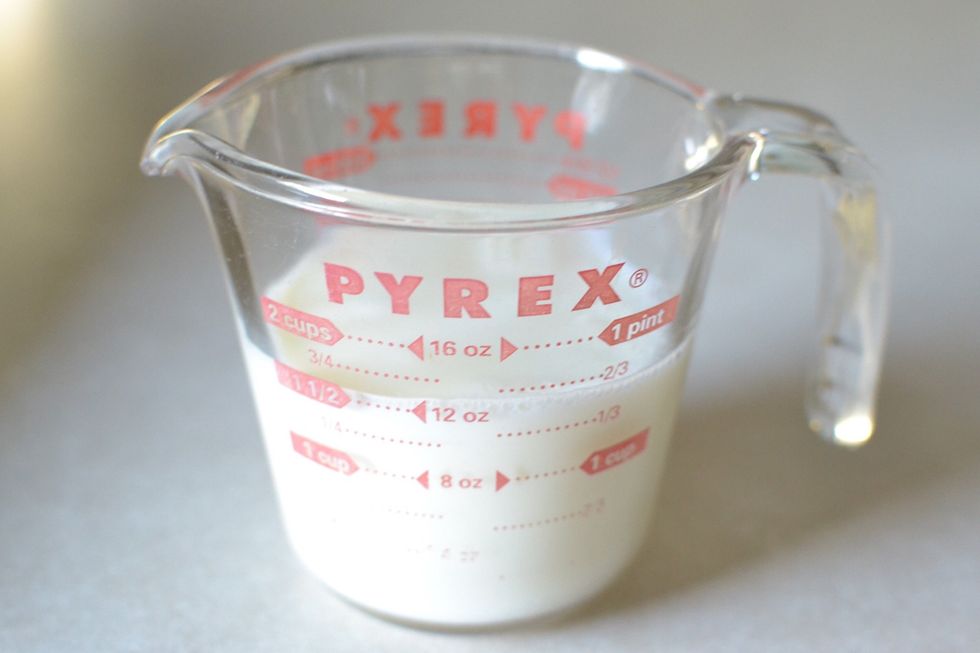 Add the milk then the vanilla extract