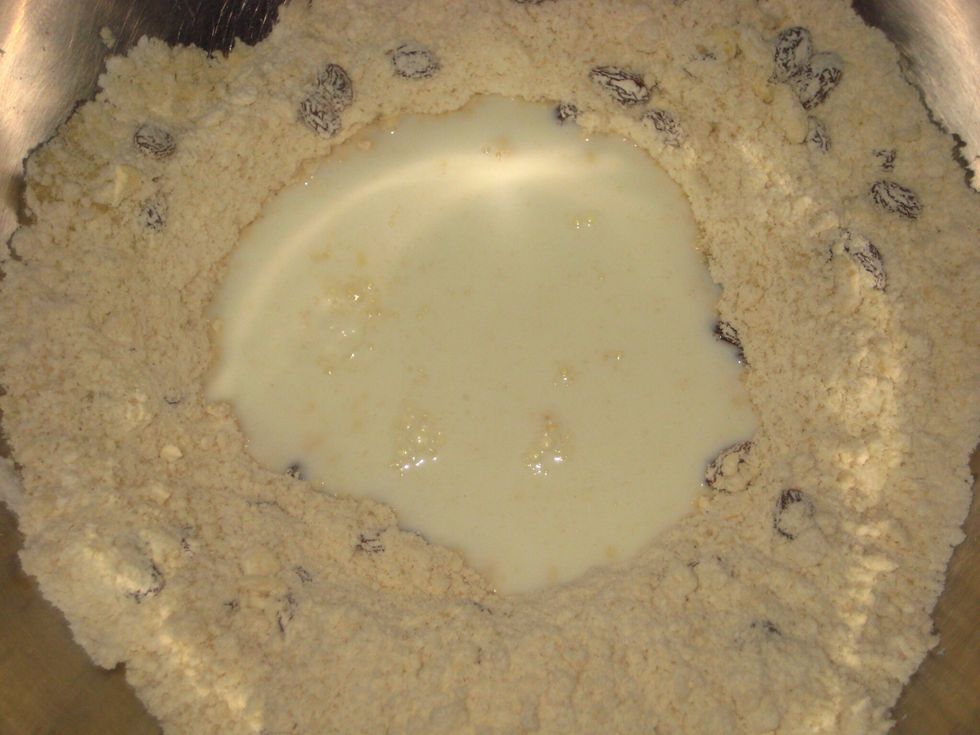 Add the milk..... This method makes it easier to mix the milk to the flour.