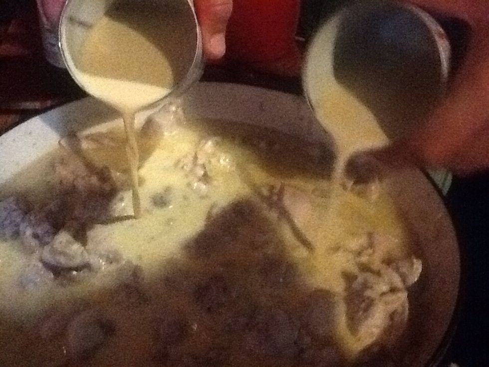 Add the milk to cover the chicken, add salt and pepper and the curry powder.