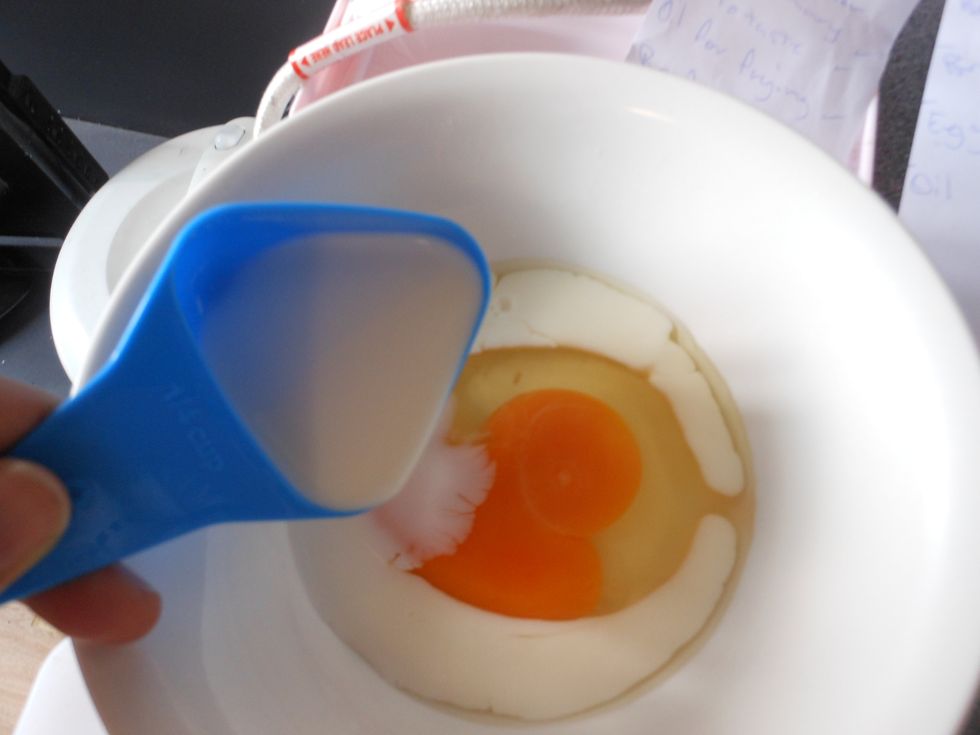 Add the milk to the egg.