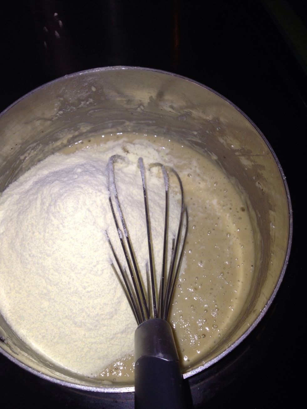 Add the milk to the flour