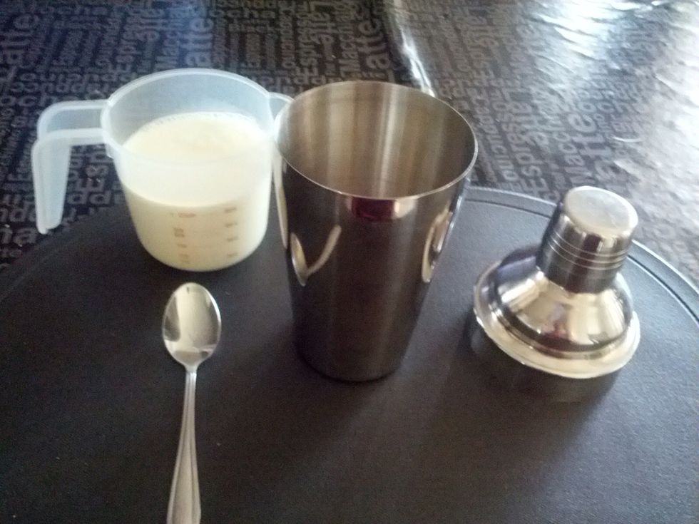 Add the milk to the shaker