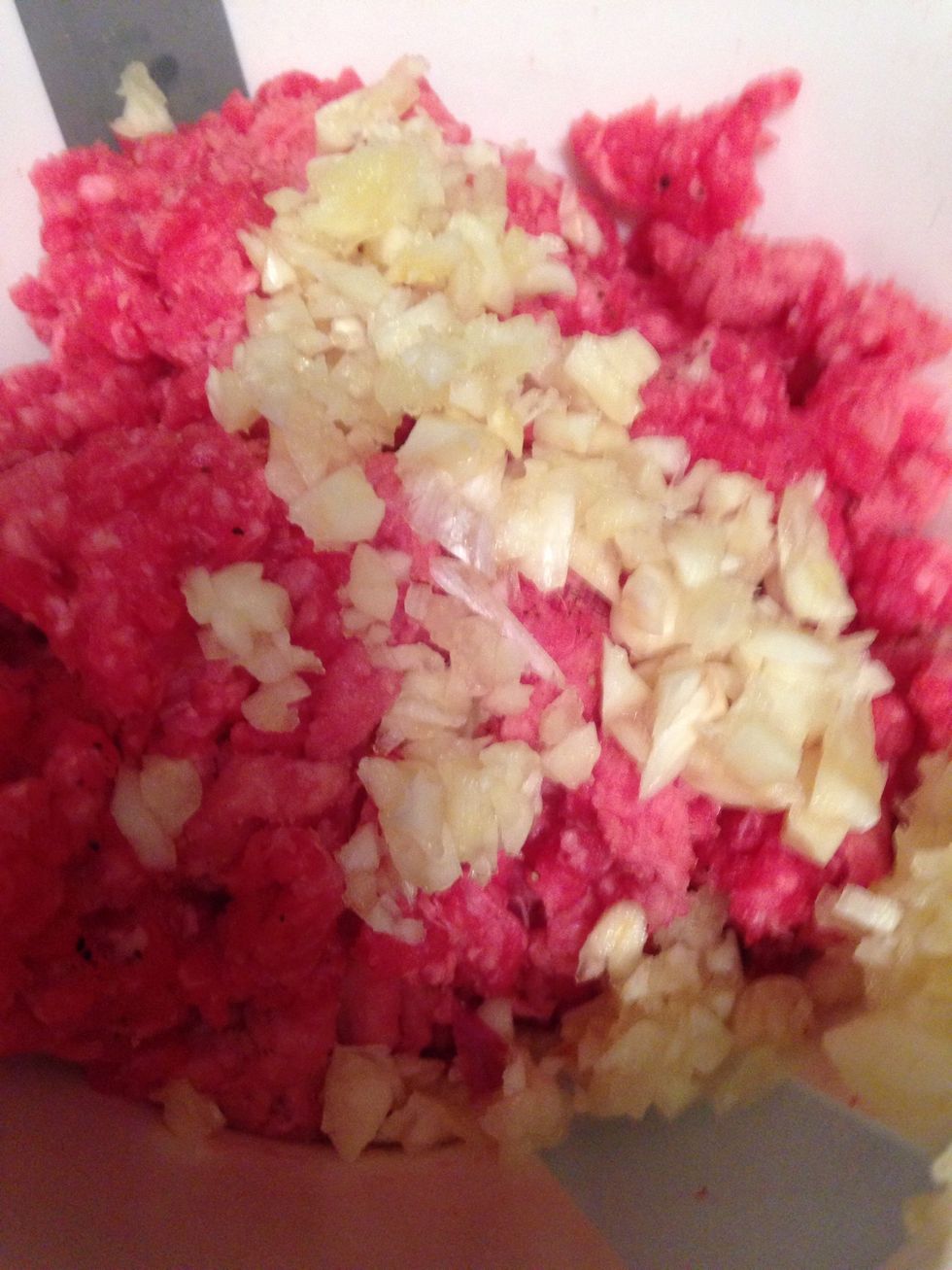 Add the mince to the garlic and half the mustard- mix until combined- form the mixture into 1/2 inch patties