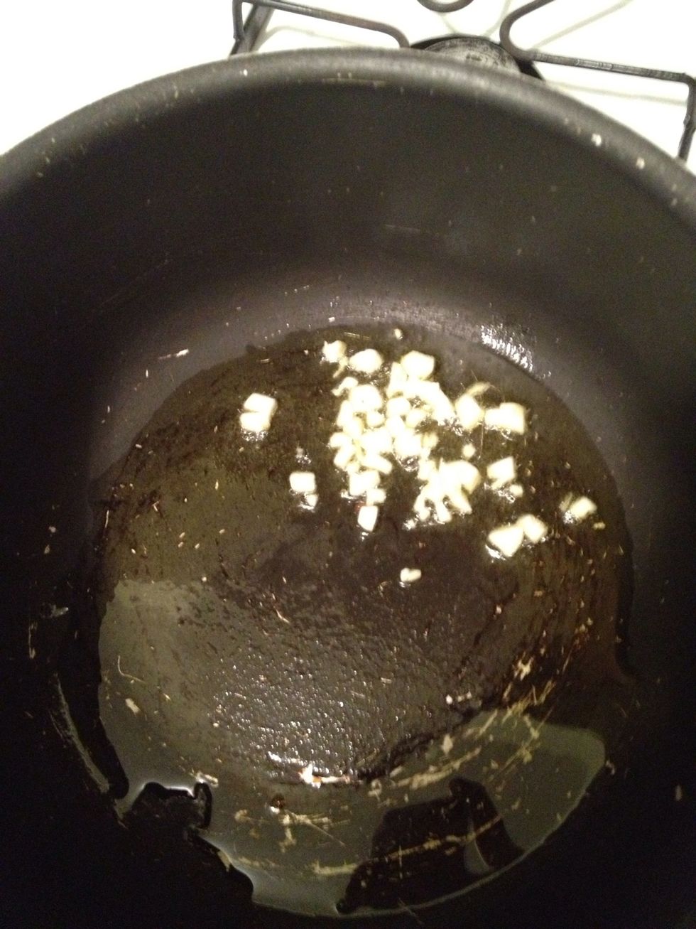 add the minced garlic to the oil . Don't let it burn!!!