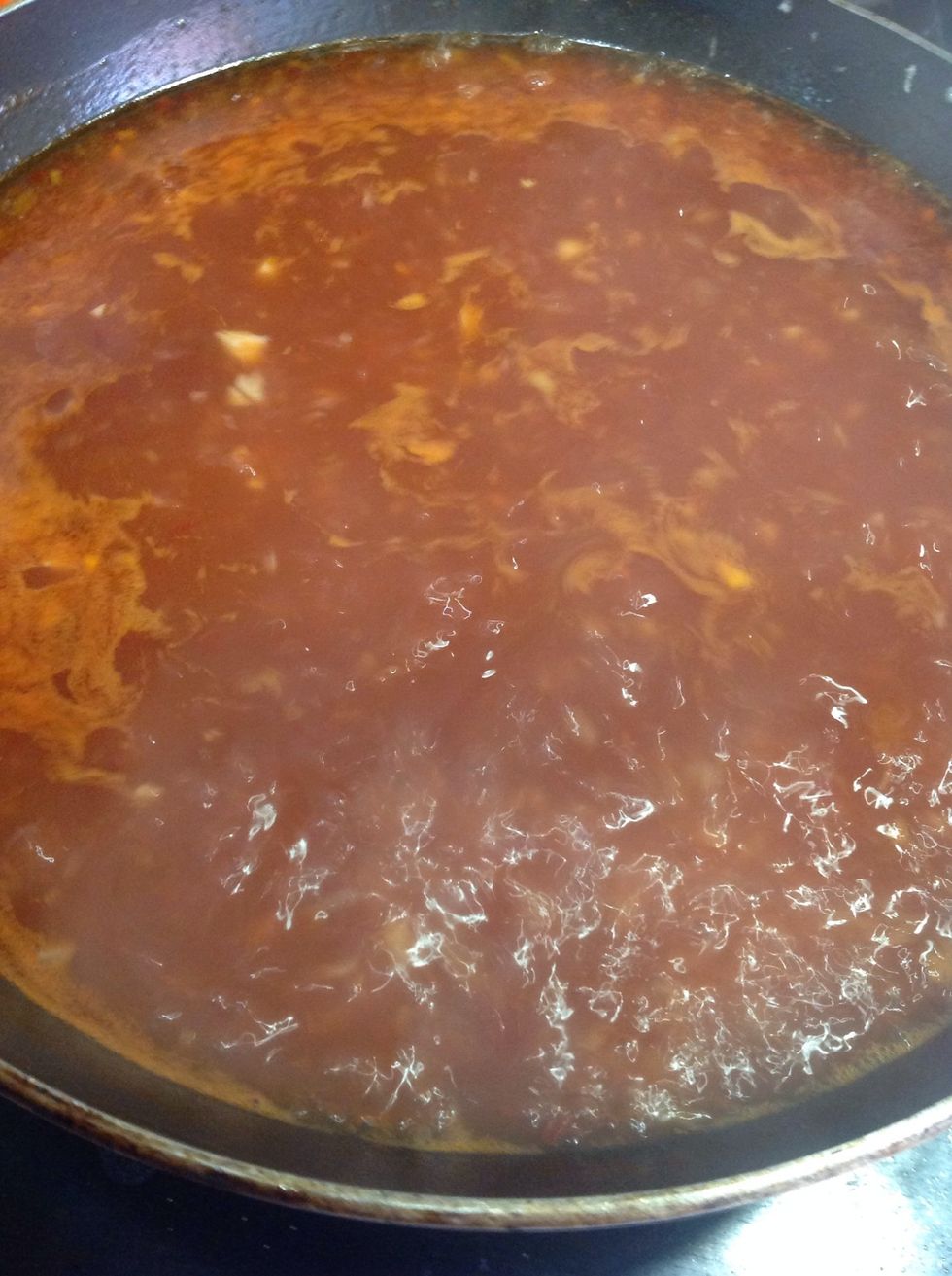 Add the mix mention before to the pan whit the onion and let it reduce whit low heat