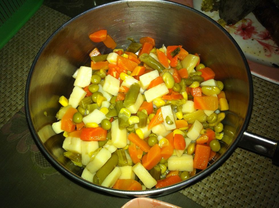 Add the mixed vegetables.