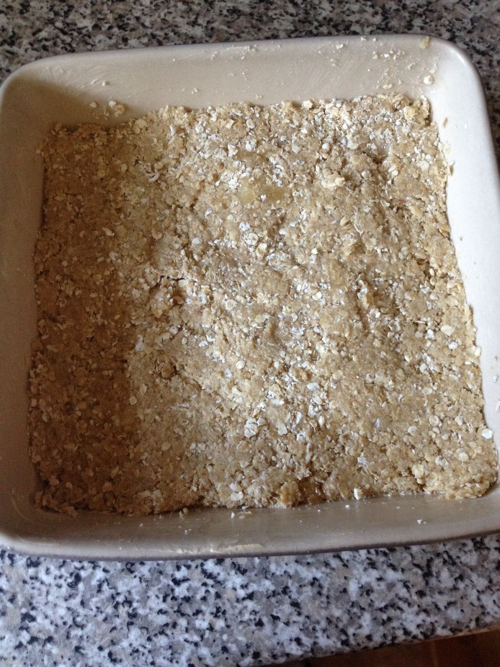 Add the mixture and flatten it down