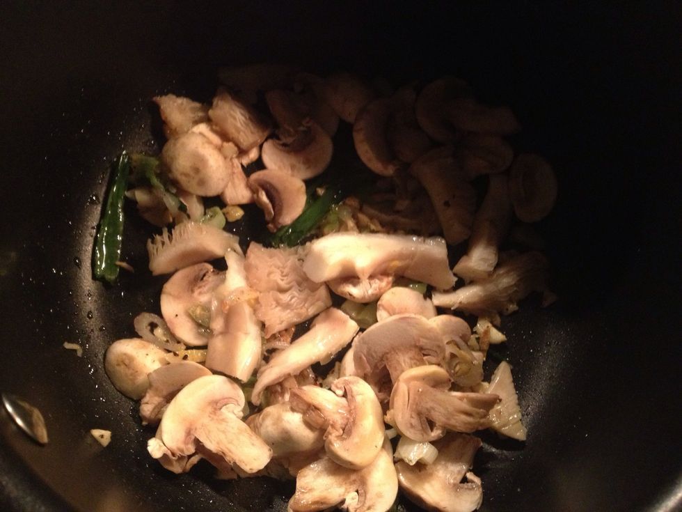 Add the mixture of mushrooms (I'm using button and oyster)
