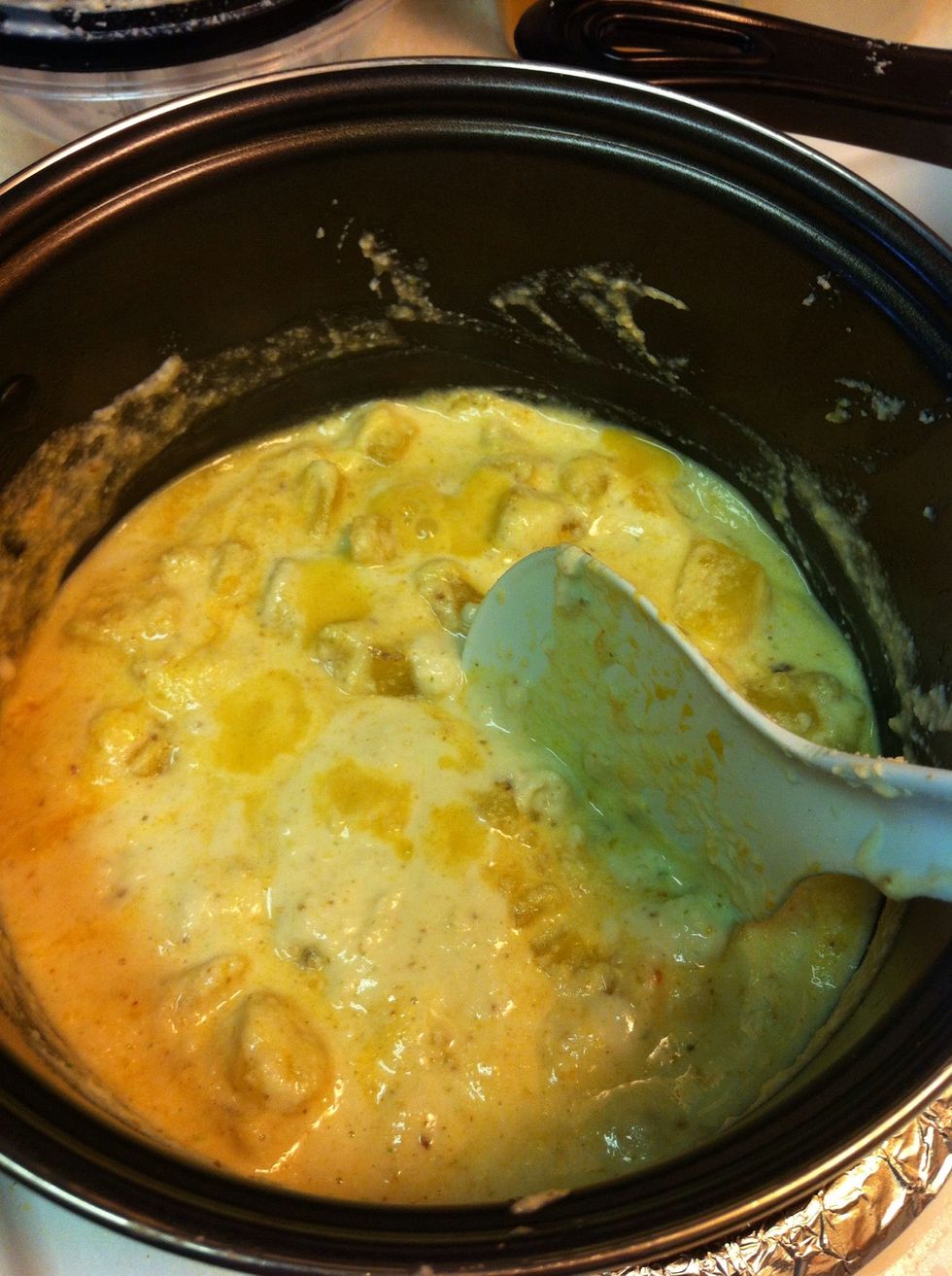 Add the mixture to the potatoes