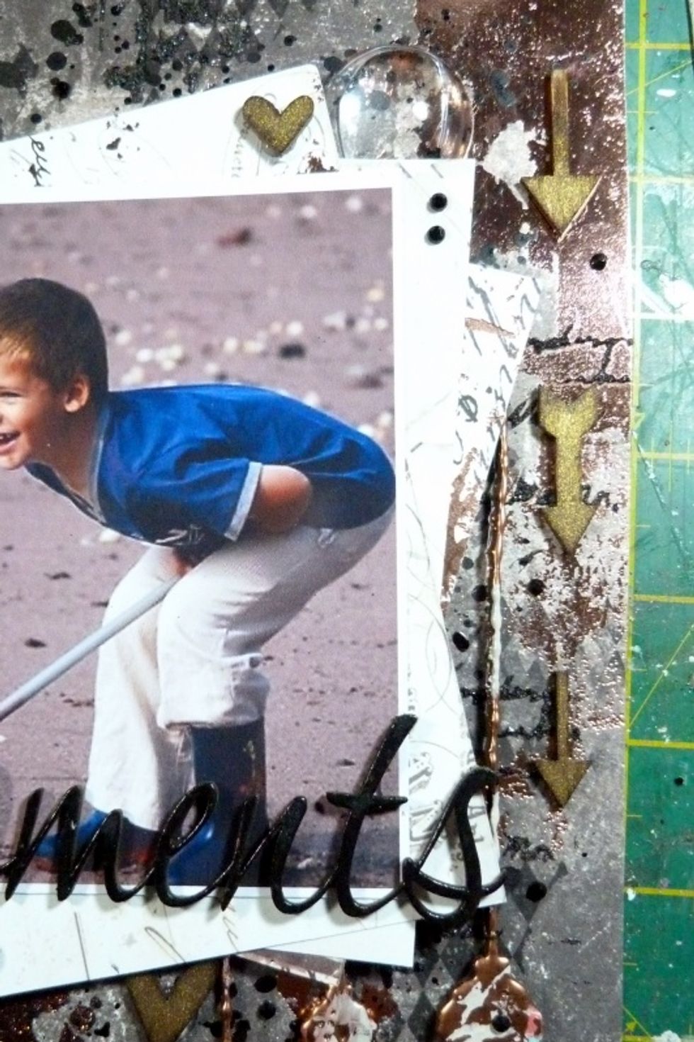 Add the 'Moments' word to the bottom of the photo. Add some Arrows down the right side of the photo & some hearts under the edges of the photo & big glass dome to the top right of photo layers