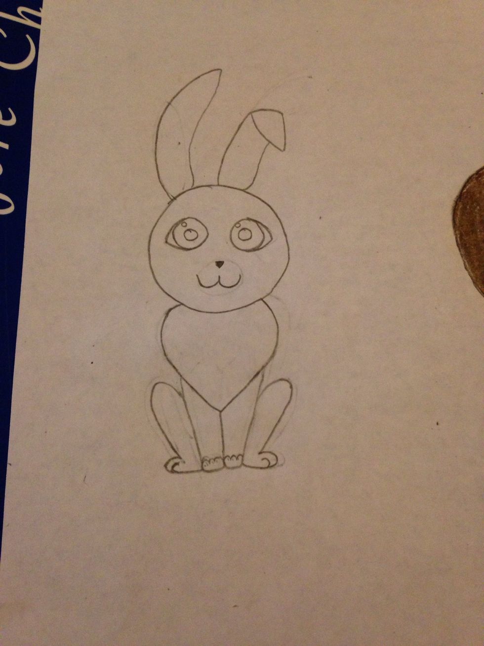 Add the mouth and a little tiny upside down triangle for the nose