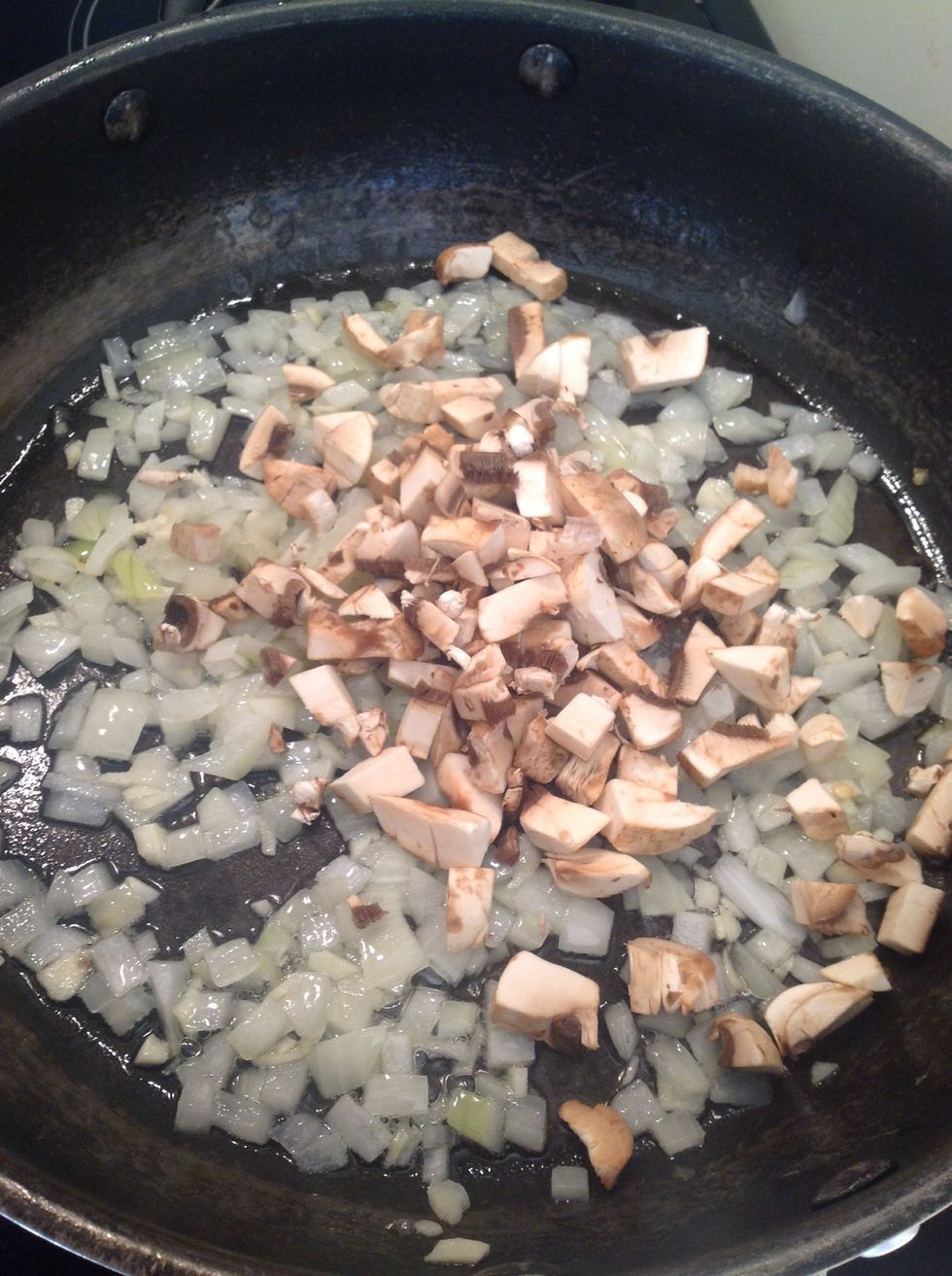 Add the mushroom and continue to fry on a gentle heat for 2-3 minutes.