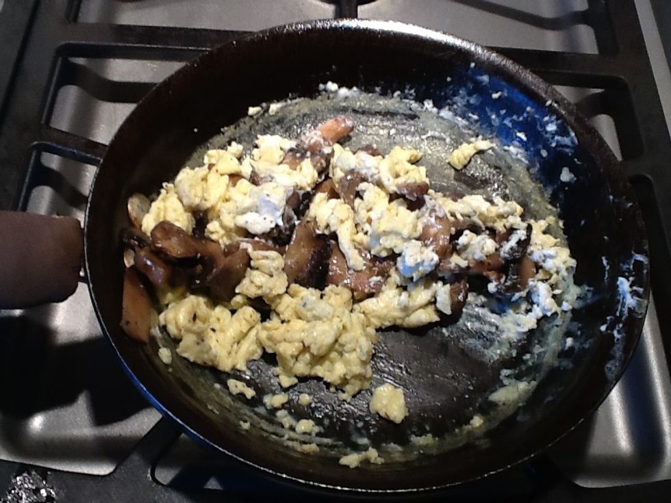 Add the mushrooms and crumbled goat cheese