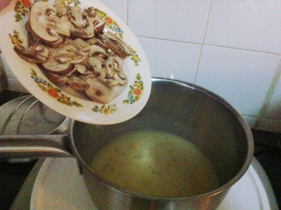 Add the mushrooms in and stir well