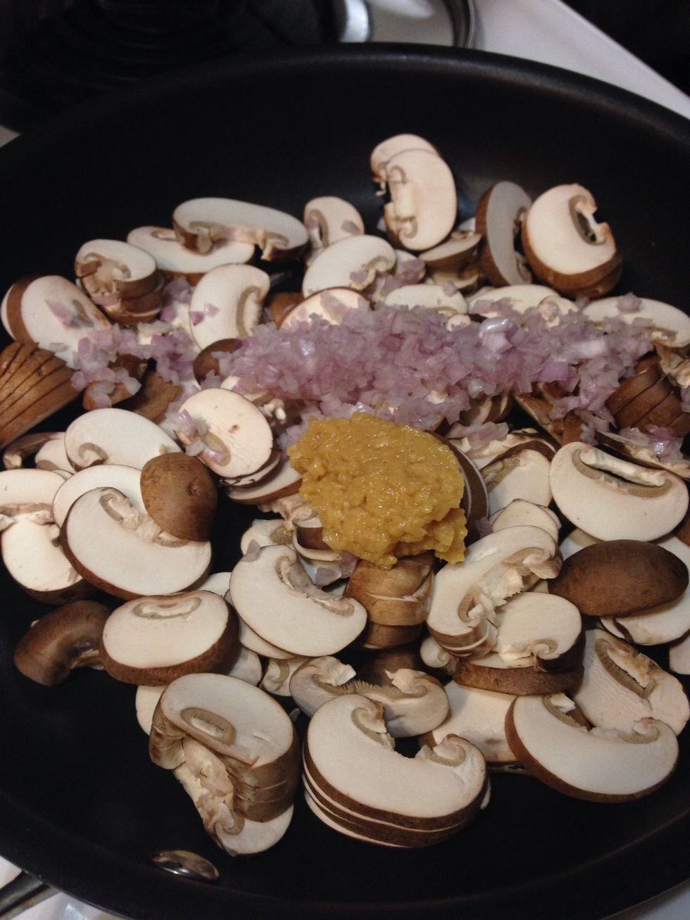 Add the mushrooms, shallot and garlic to the pan.  Add a touch of oil and cook until the mushrooms are wilted.