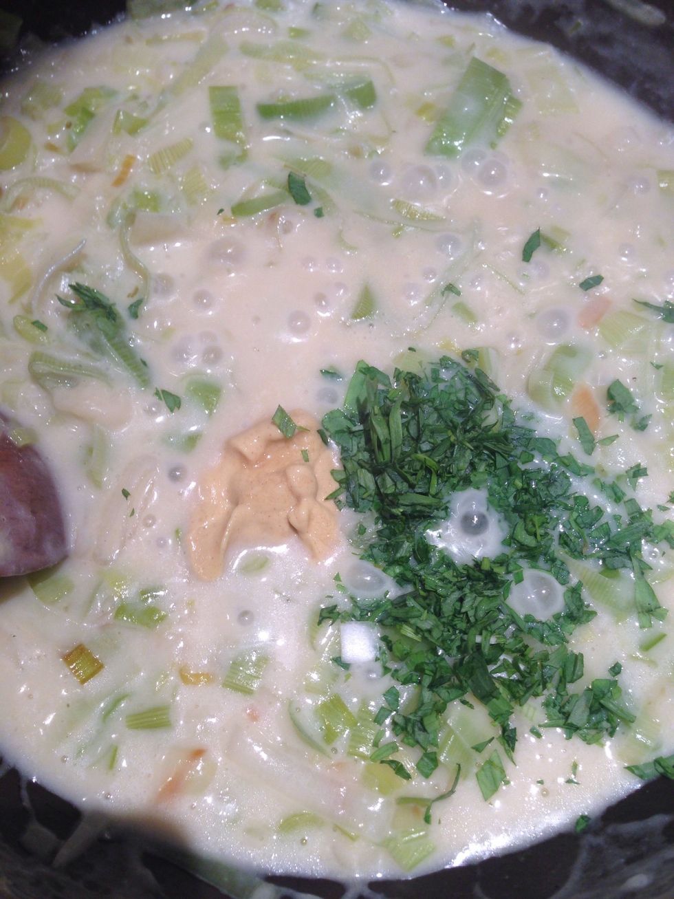 Add the mustard and chopped tarragon