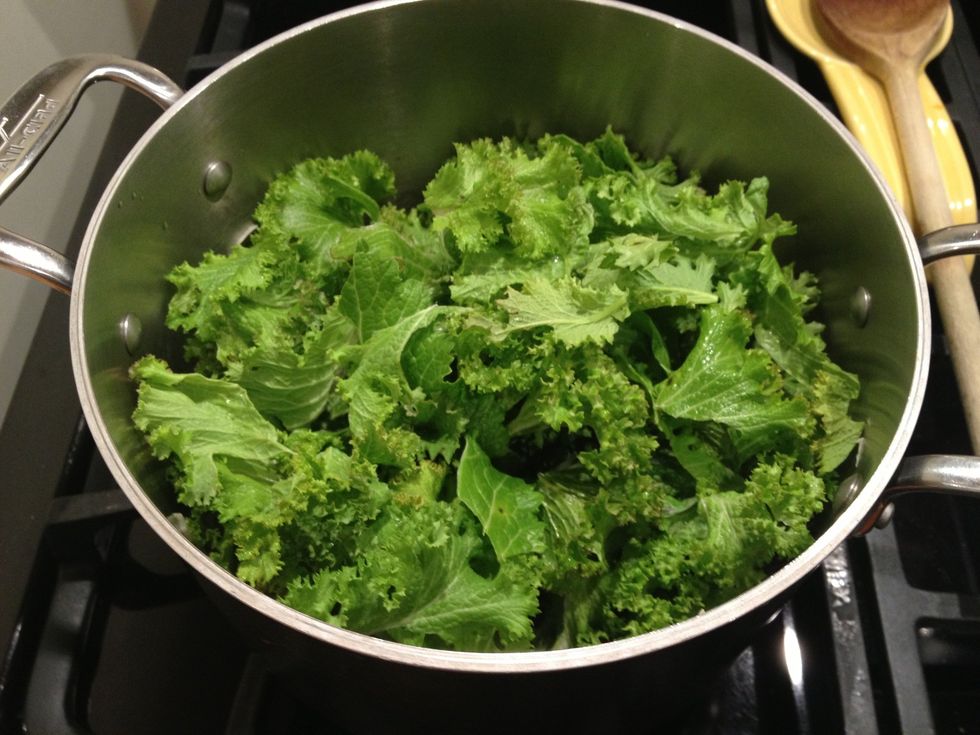 Add the mustard greens.