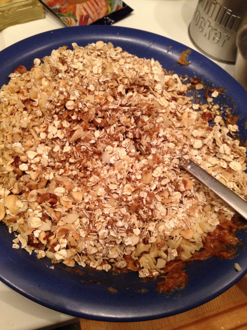 Add the oatmeal and the chopped nuts in the mix.