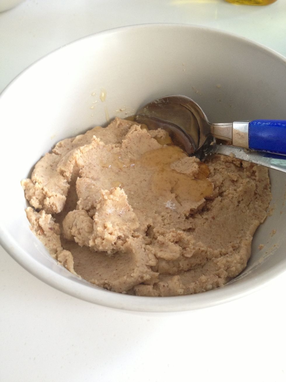Add the oil, honey and salt into the processor and continue blending (or mix everything in a bowl) until the consistency you like. Add more oil for a more runny mixture.