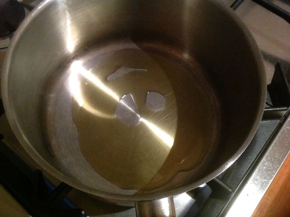 Add the oil into the pot( smiley face optional )