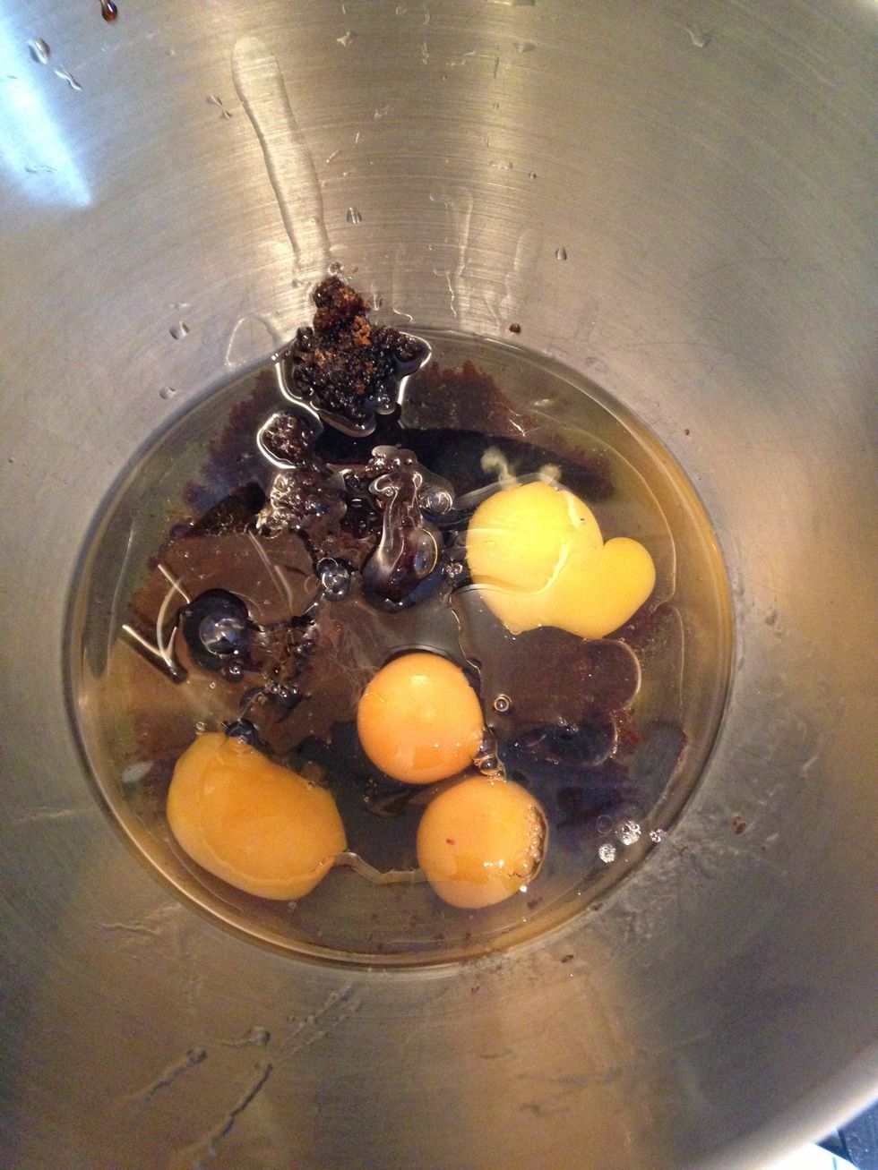 Add the oil, sugar, golden syrup and eggs to a mixing bowl