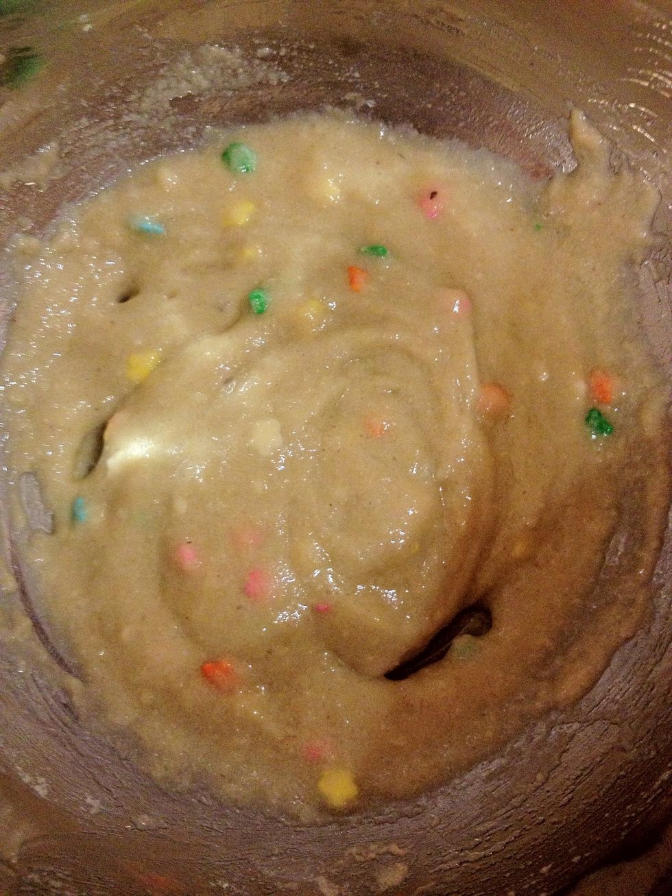 Add the oil to the bowl of ingredients and mix until well combined.  Save a tiny bit of the oil to coat a small ramekin.