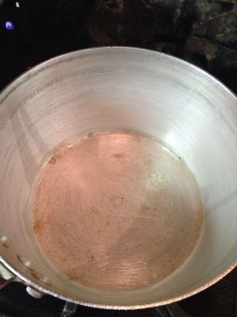 Add the oil to the pot and let it warm up for a few seconds in hi heat