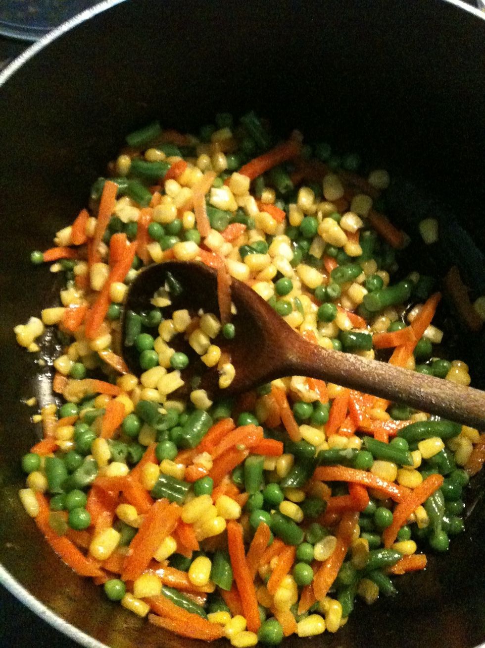 Add the oil to your pot, when hot put in ur veg n fry until all d water from d frozen veg is all gone n you r actually fryn the veg agan.