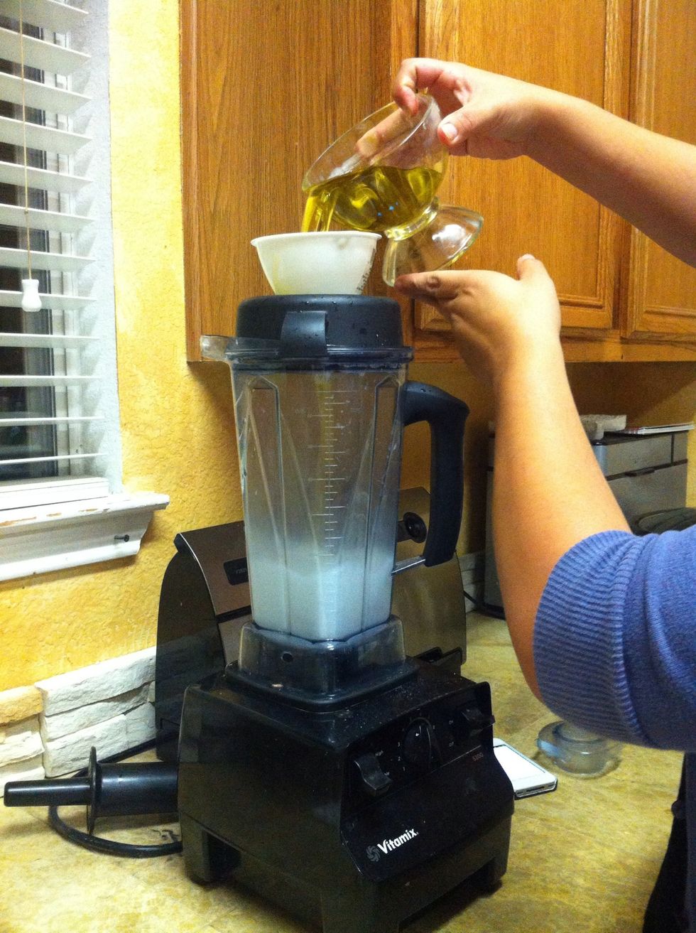 Add the olive oil and beeswax mix to the water and blend until it looks like.........