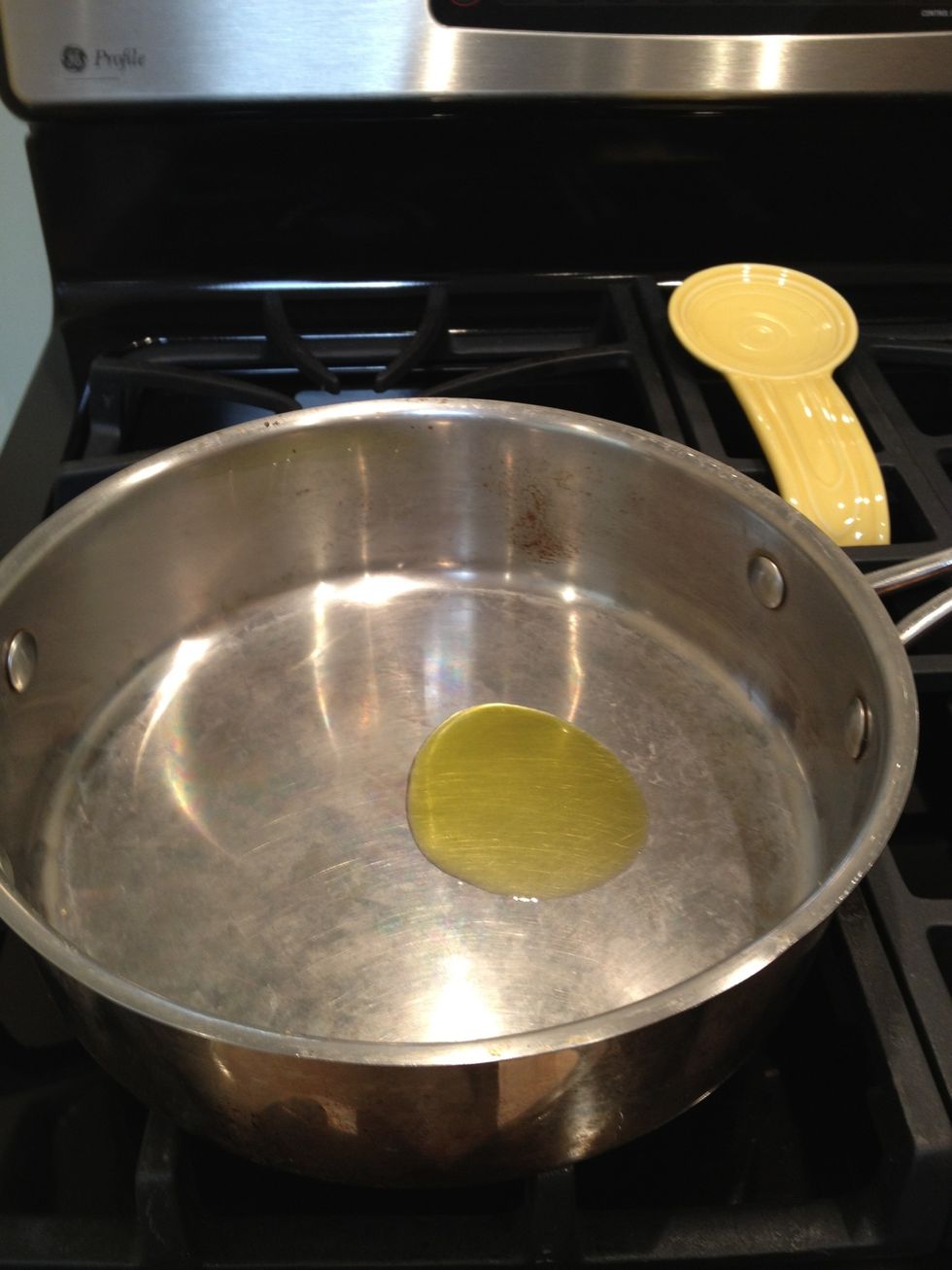 Add the olive oil to a heavy skillet, over medium high heat.