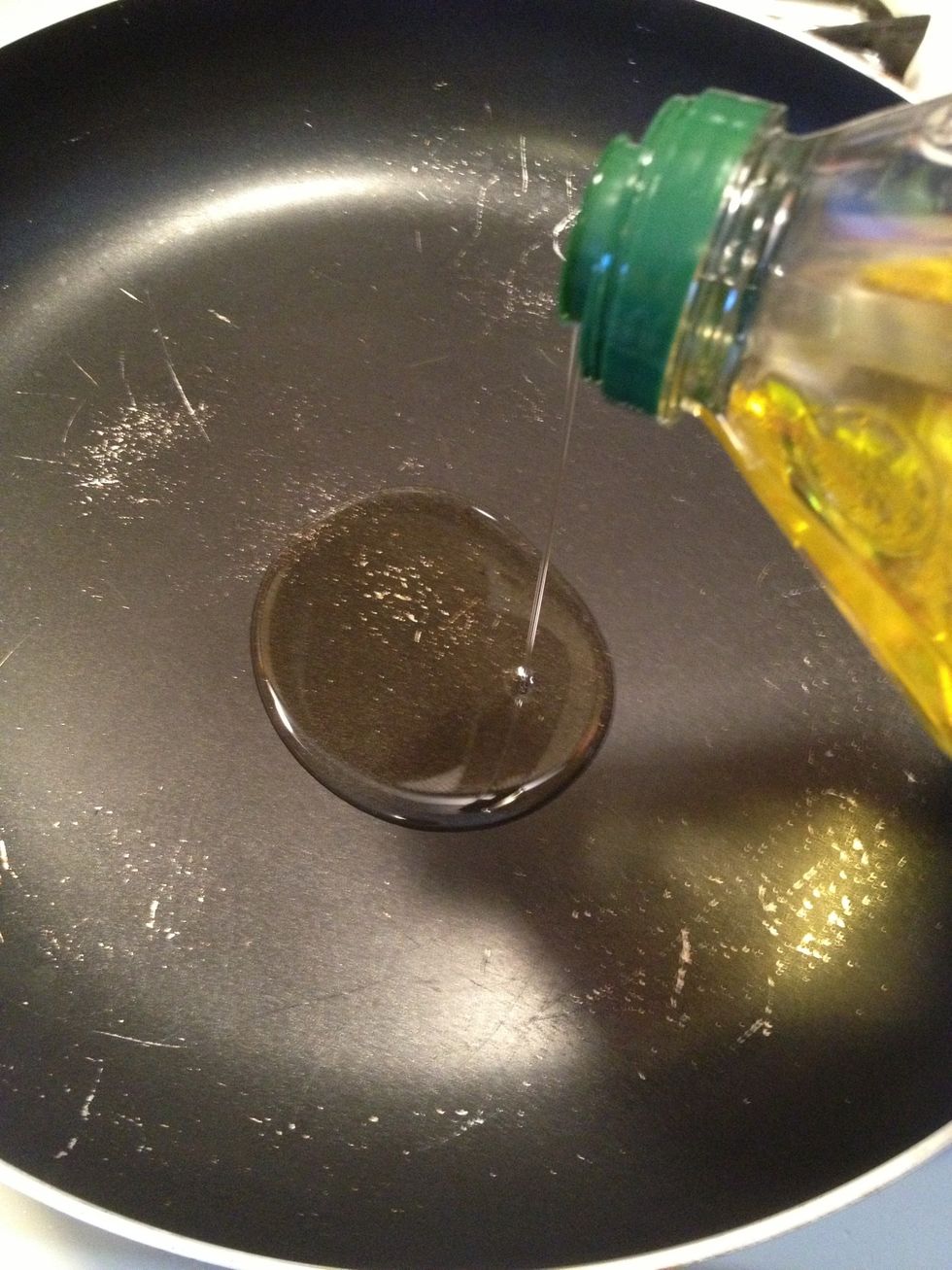 Add the olive oil to pan over medium high heat.