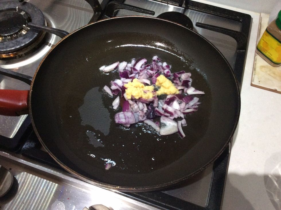 Add the onion and garlic and cook, stirring, for 5 minutes or until onion softens.
