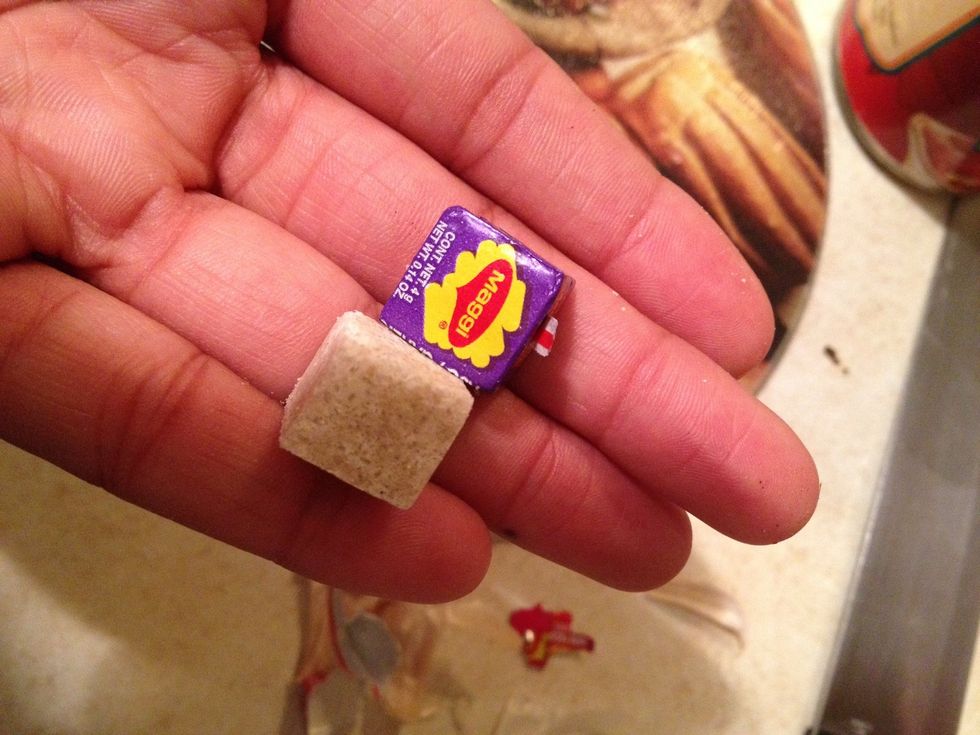 Add the onion and garlic cubes