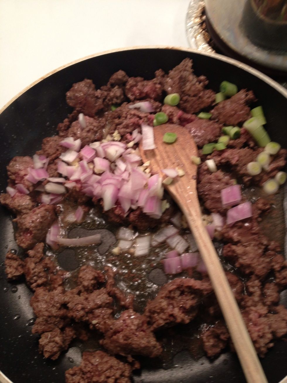 Add the onions and garlic and continue to cook. Smells yummy