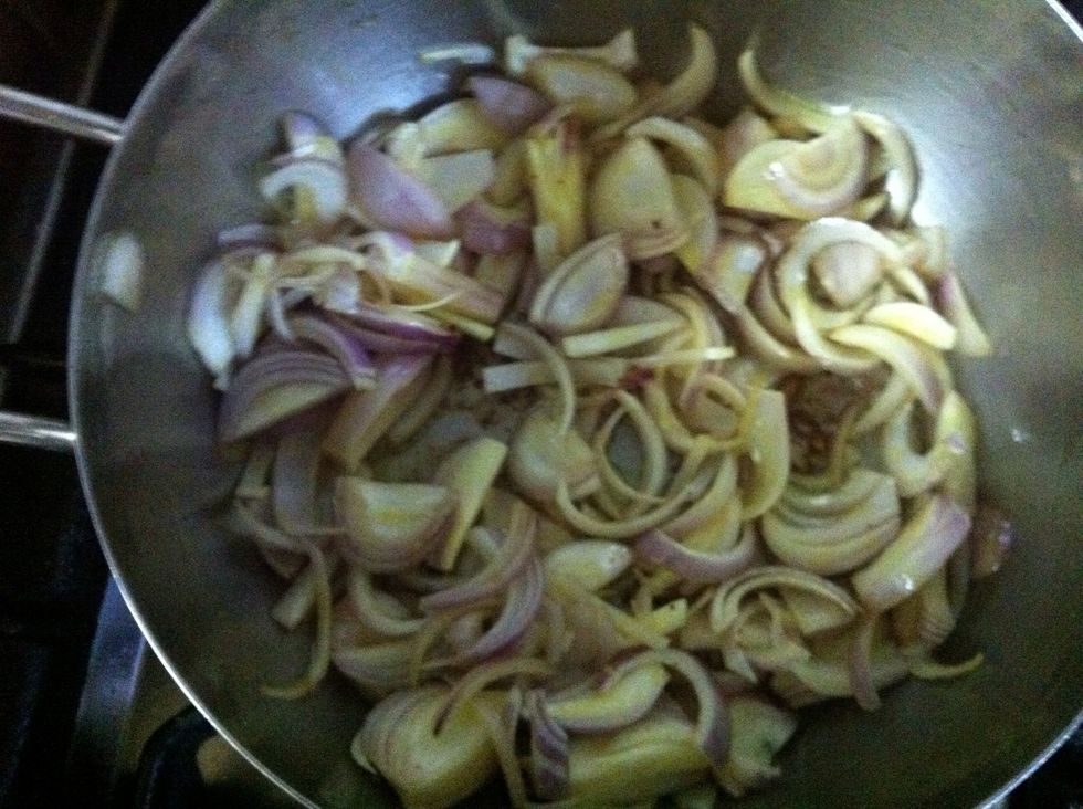 Add the onions into the same pot with the same oil, stir untill it's a deep chocolatey brown color