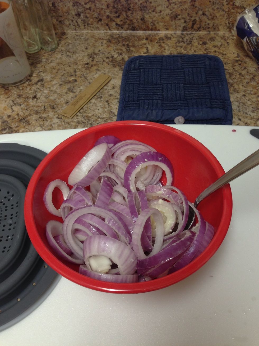 Add the onions to the bowl.