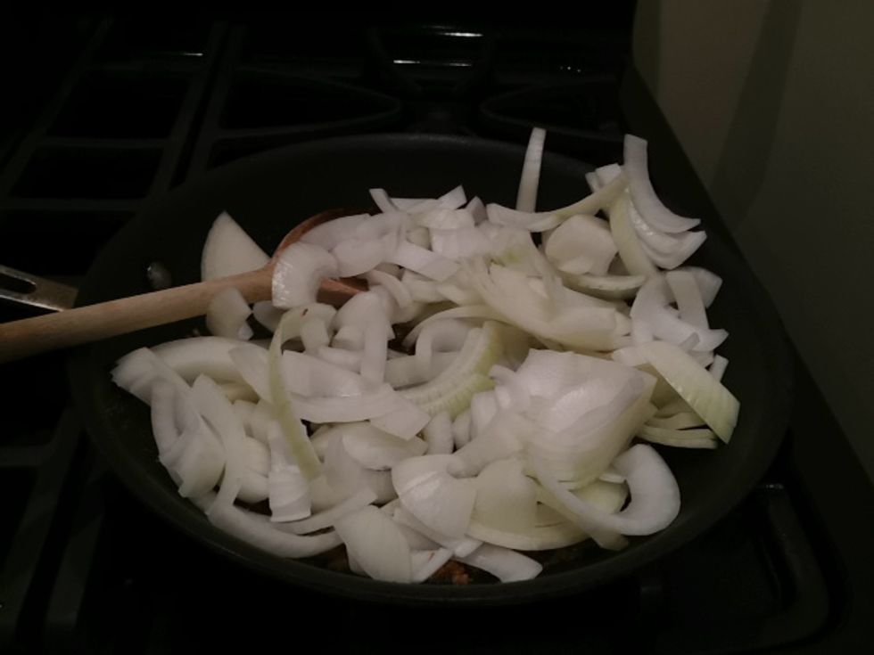 Add the onions to the skillet.