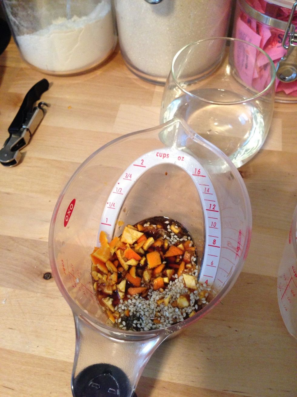 Add the orange to the mixture and stir everything together. (I know there is more than 1/4 an orange peel pictured. I took some of the peel out later because it was over powering)